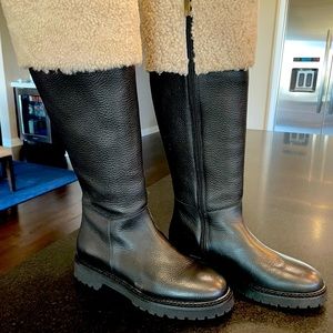 Aquatalia Magnolia black leather and shearling weatherproof boots.